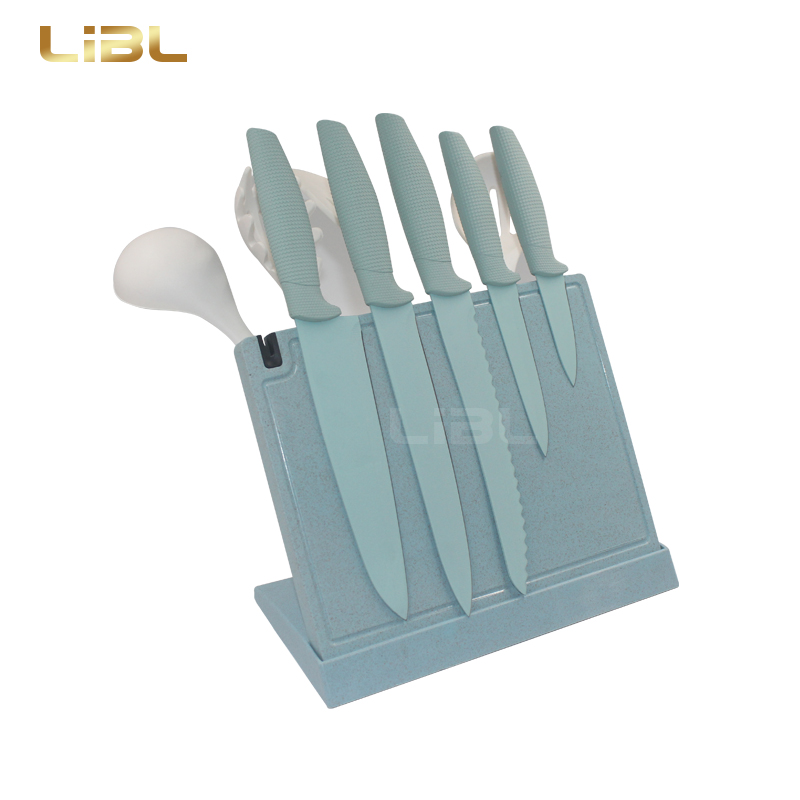 Knife set with cutting board and cooking utensils